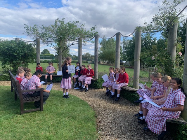 Debating in the classical garden, Copthill School