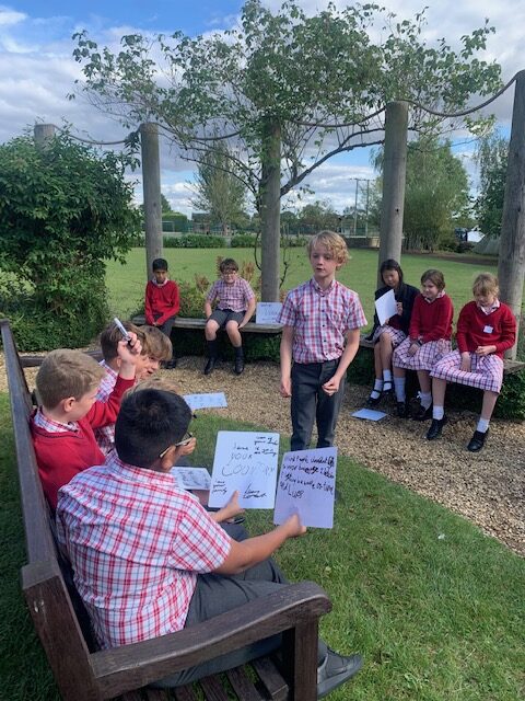 Debating in the classical garden, Copthill School