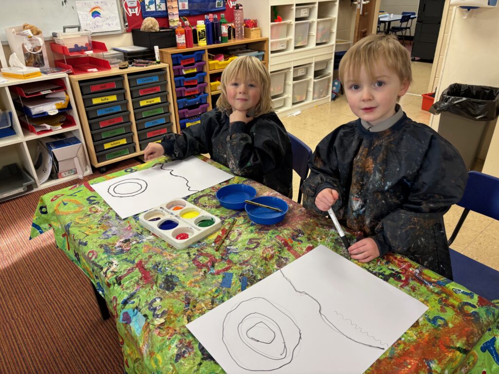 Ted Harrison style Inukshuk artwork, Copthill School